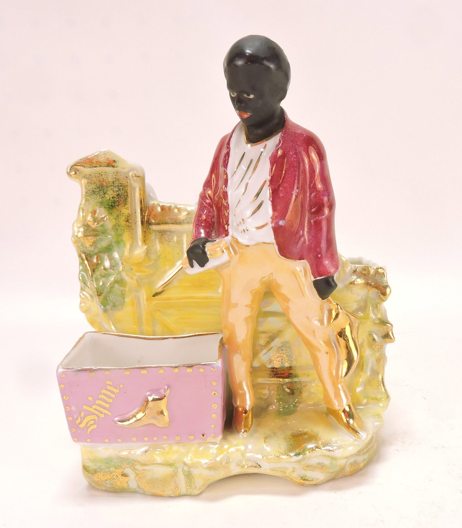 Black Americana porcelain figural: match holder of shoe shine boy, 6 1/2"