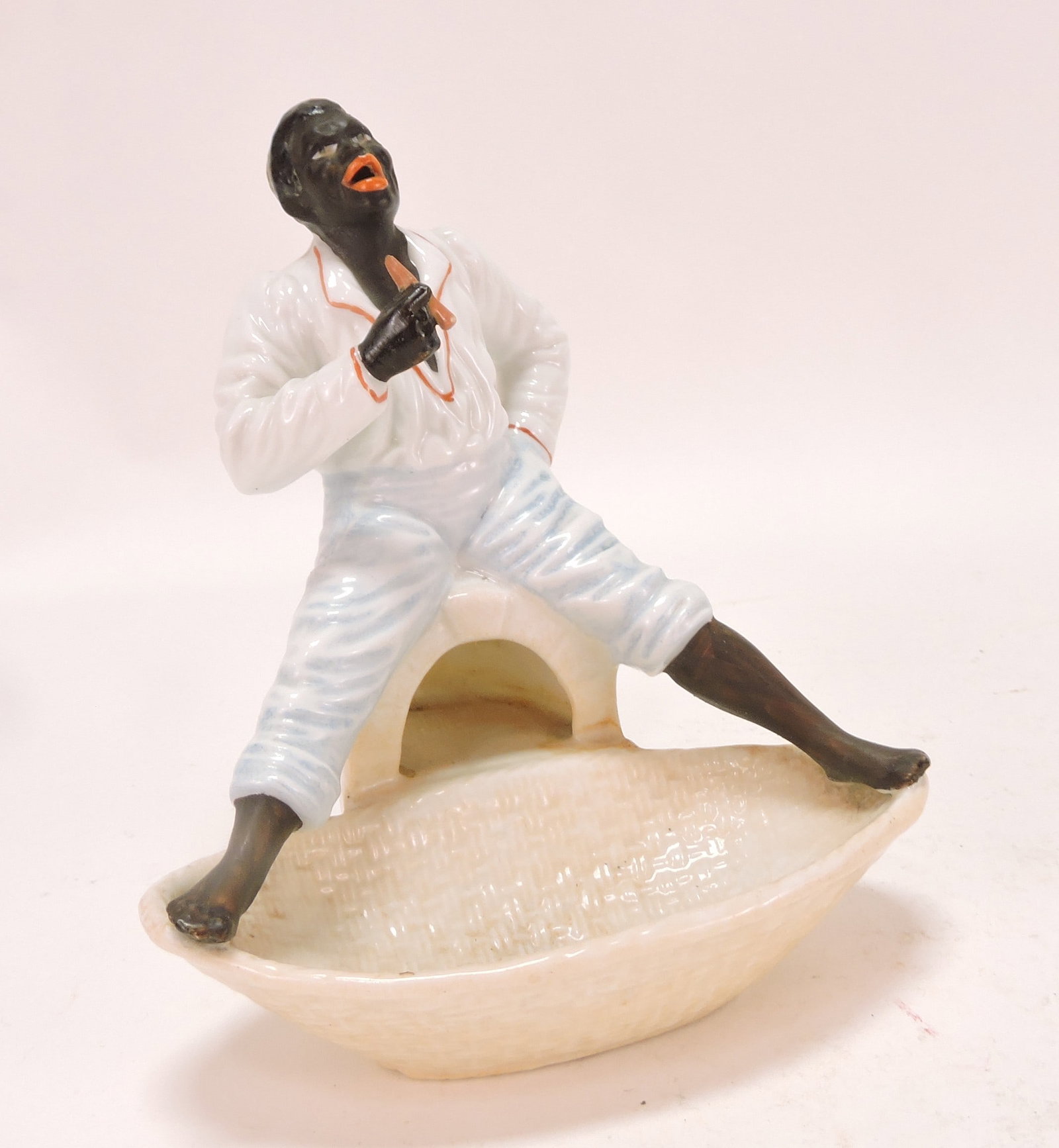 Black Americana porcelain man: with cigar and basket tray, 5"