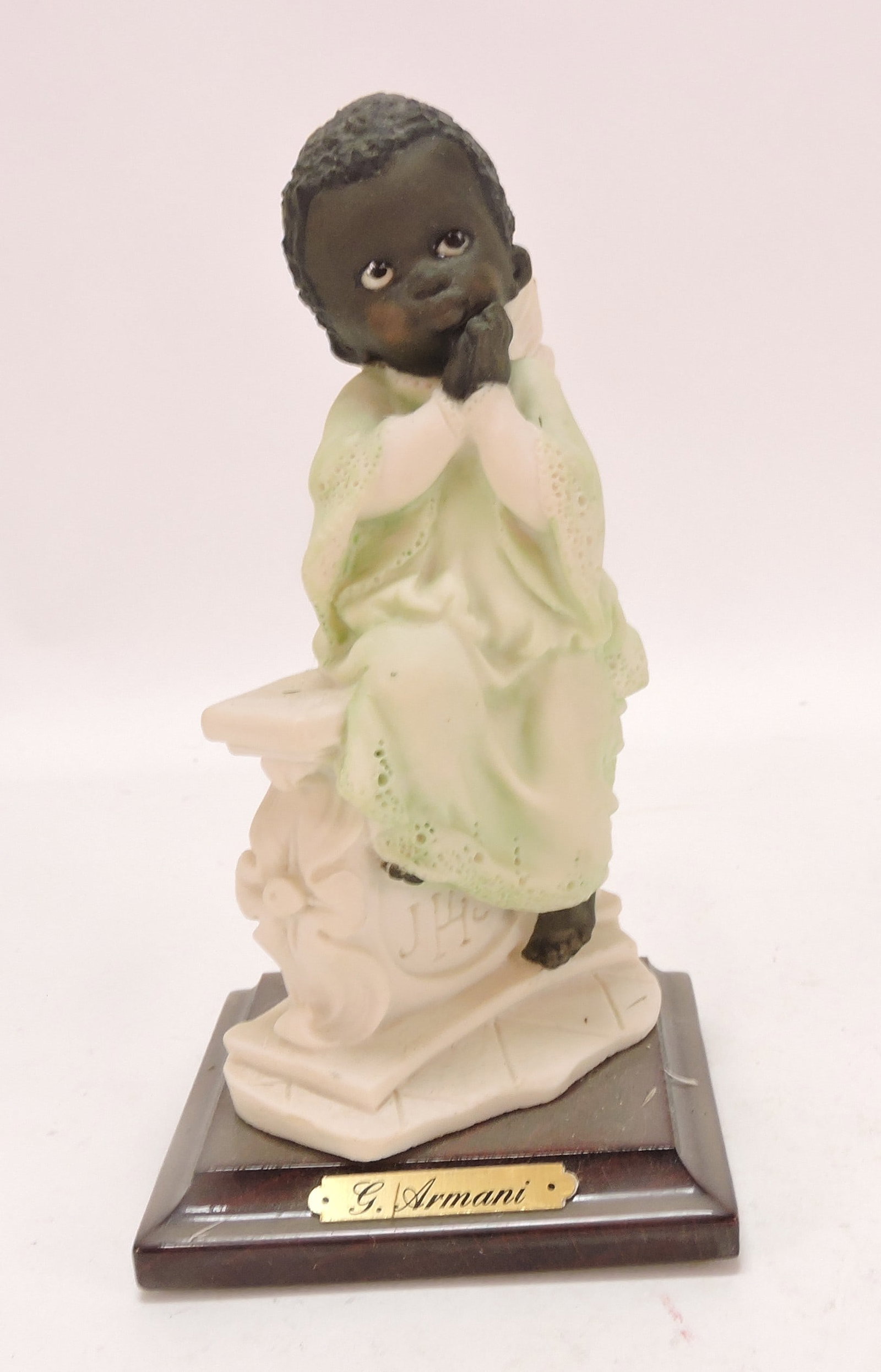 Black Americana G. Armani figure,
