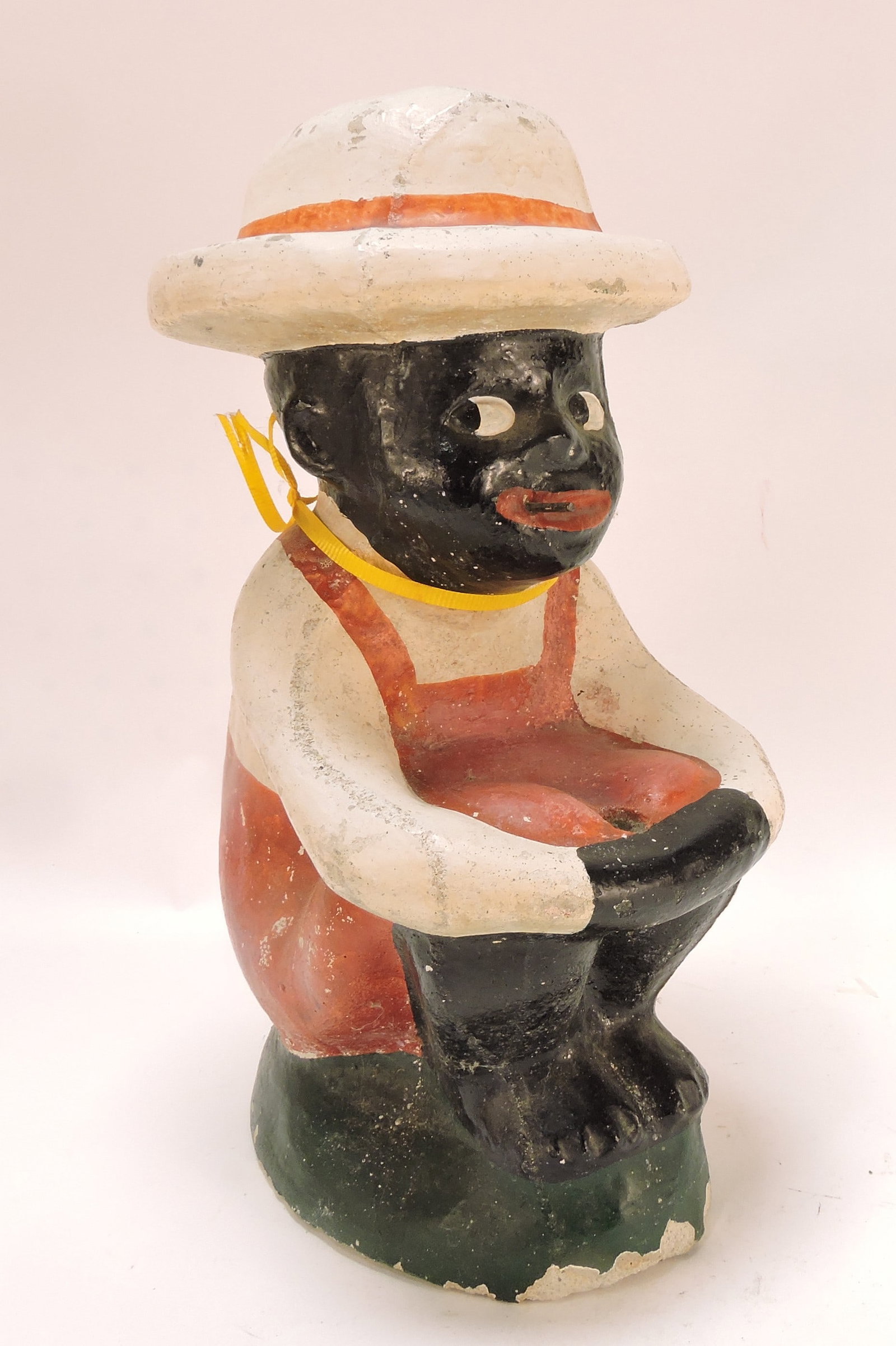 Black Americana concrete yard ornament,