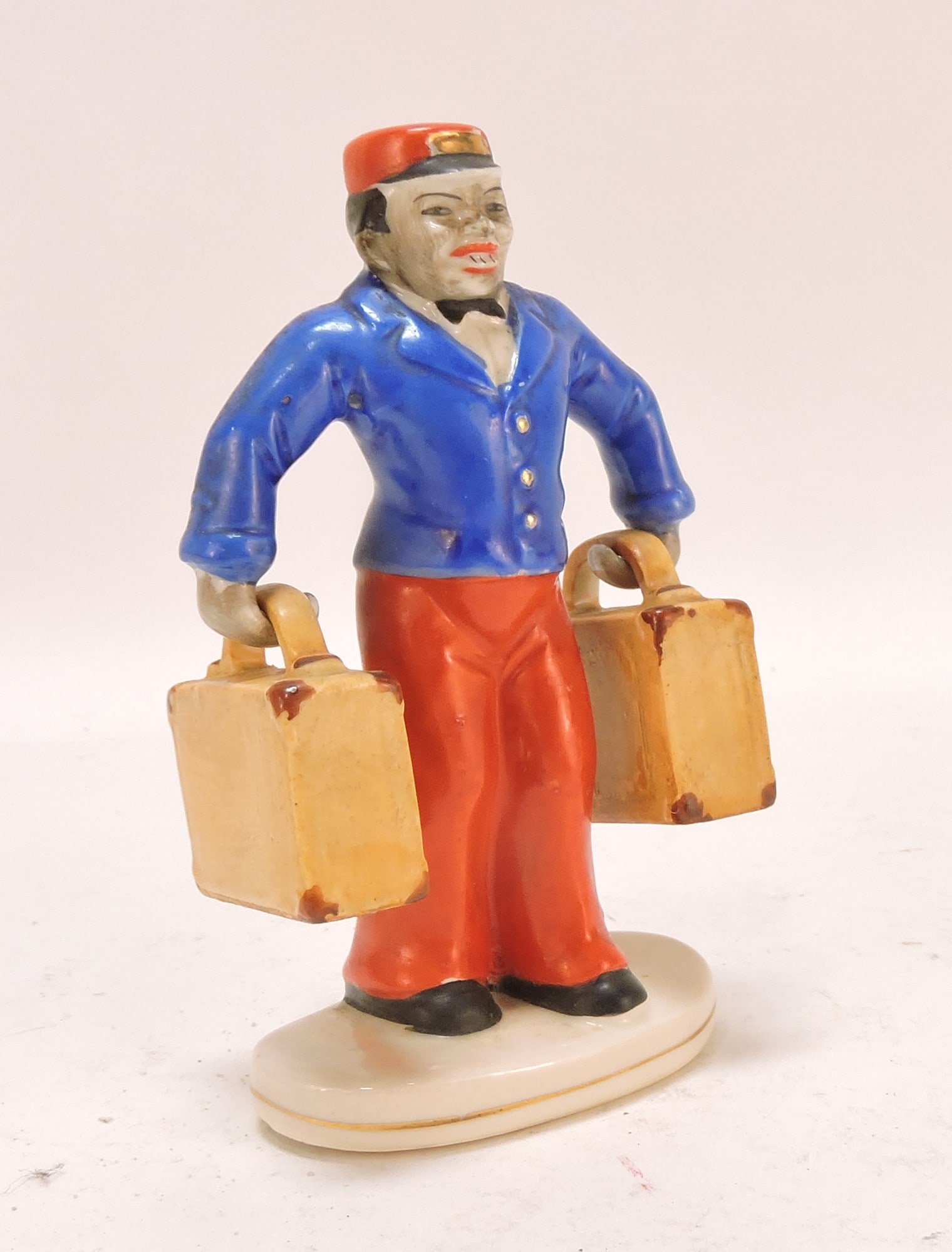 Black Americana porcelain bellhop: salt & pepper shaker, 4 1/2"