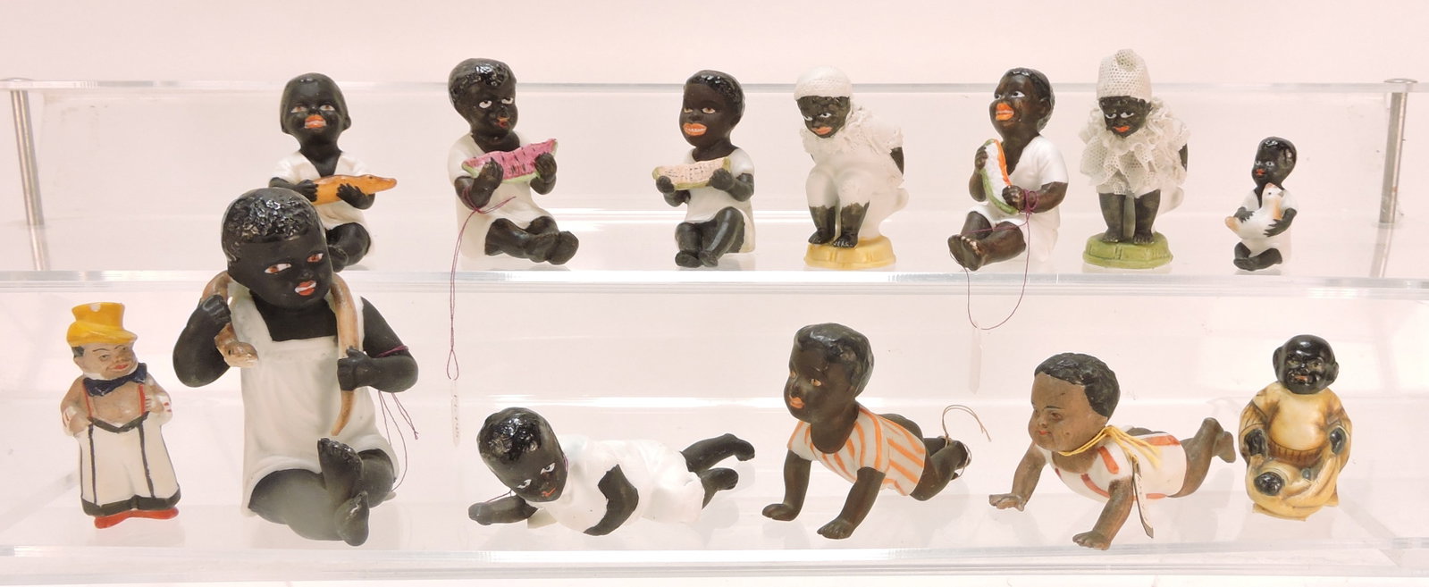 Black Americana lot of 13 figures,: .