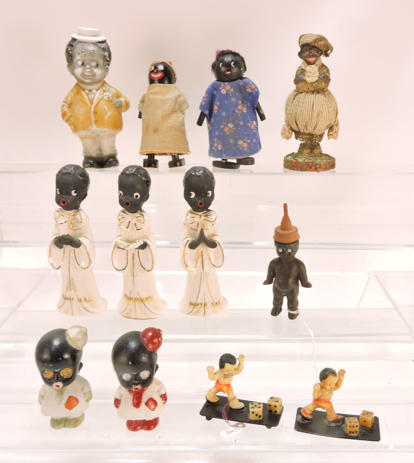 Black Americana lot of 12 figures,
