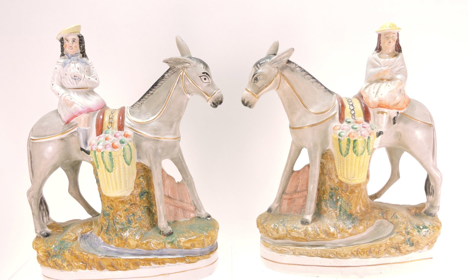 Staffordshire pair of donkeys with (1 of 1)