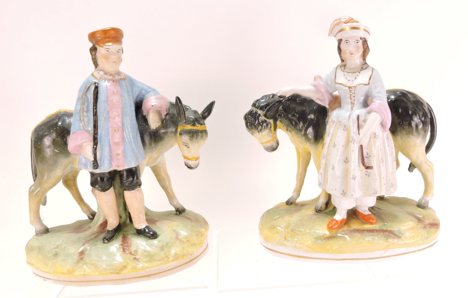 Staffordshire pair of donkeys with (1 of 1)