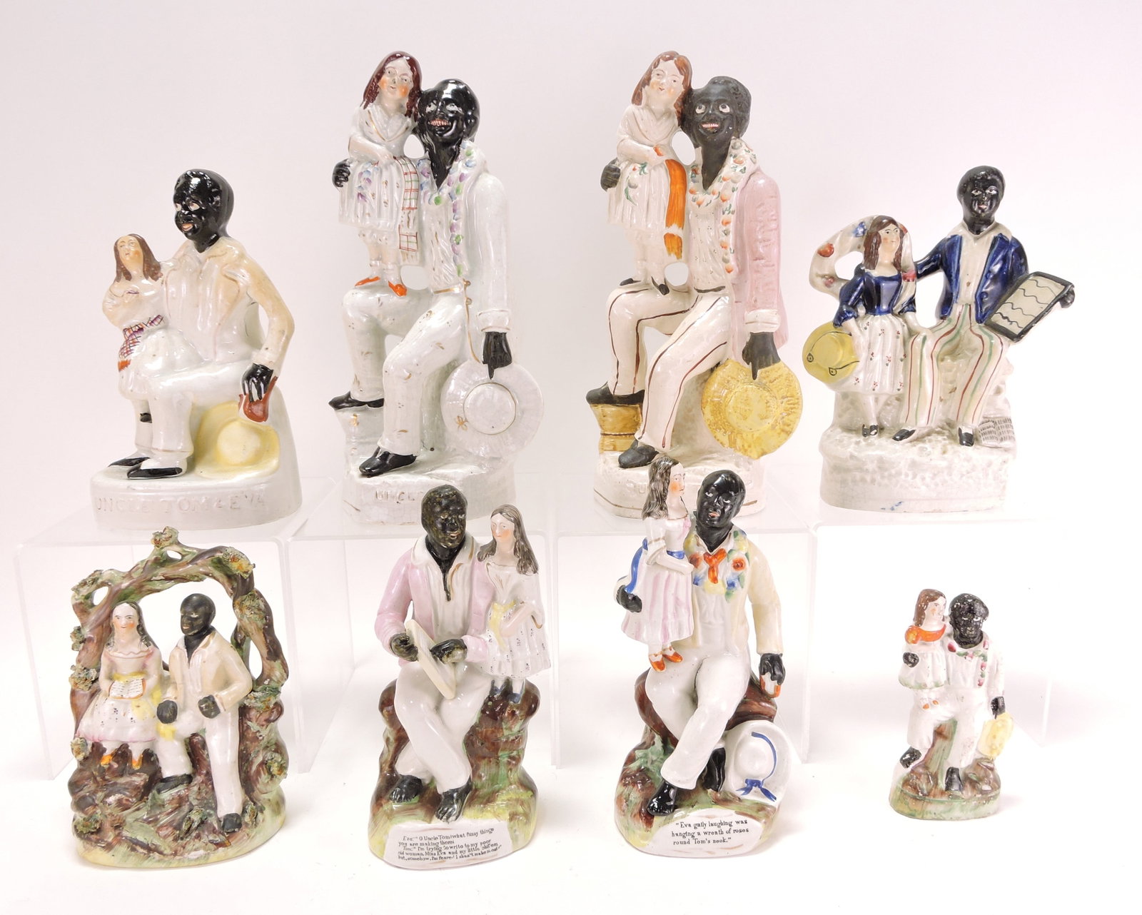 Staffordshire lot of 8 'Uncle Tom and Eva': figures, 5" to 11"