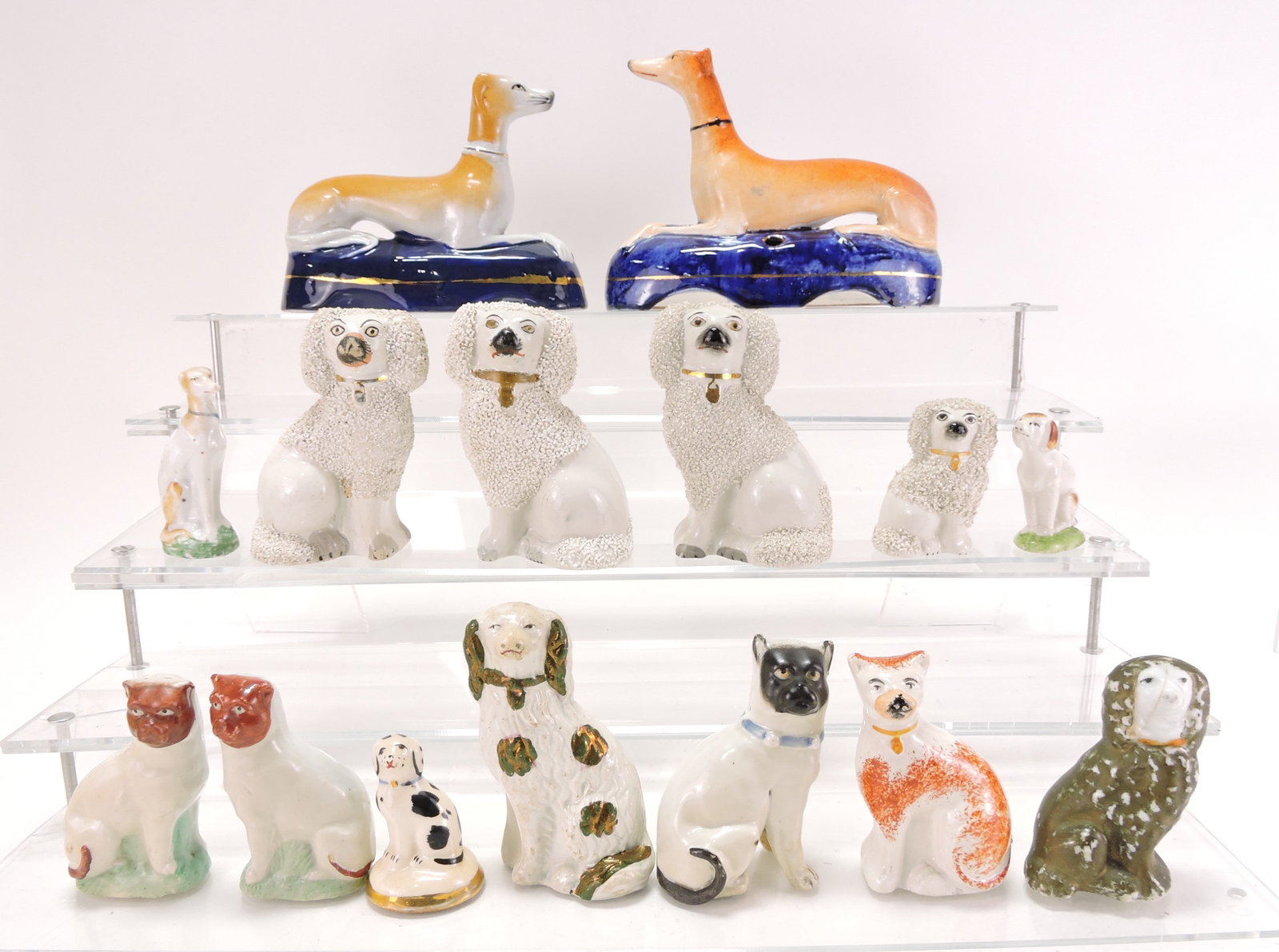 Staffordshire lot of 15 dog figures,: 2 1/2" to 6"