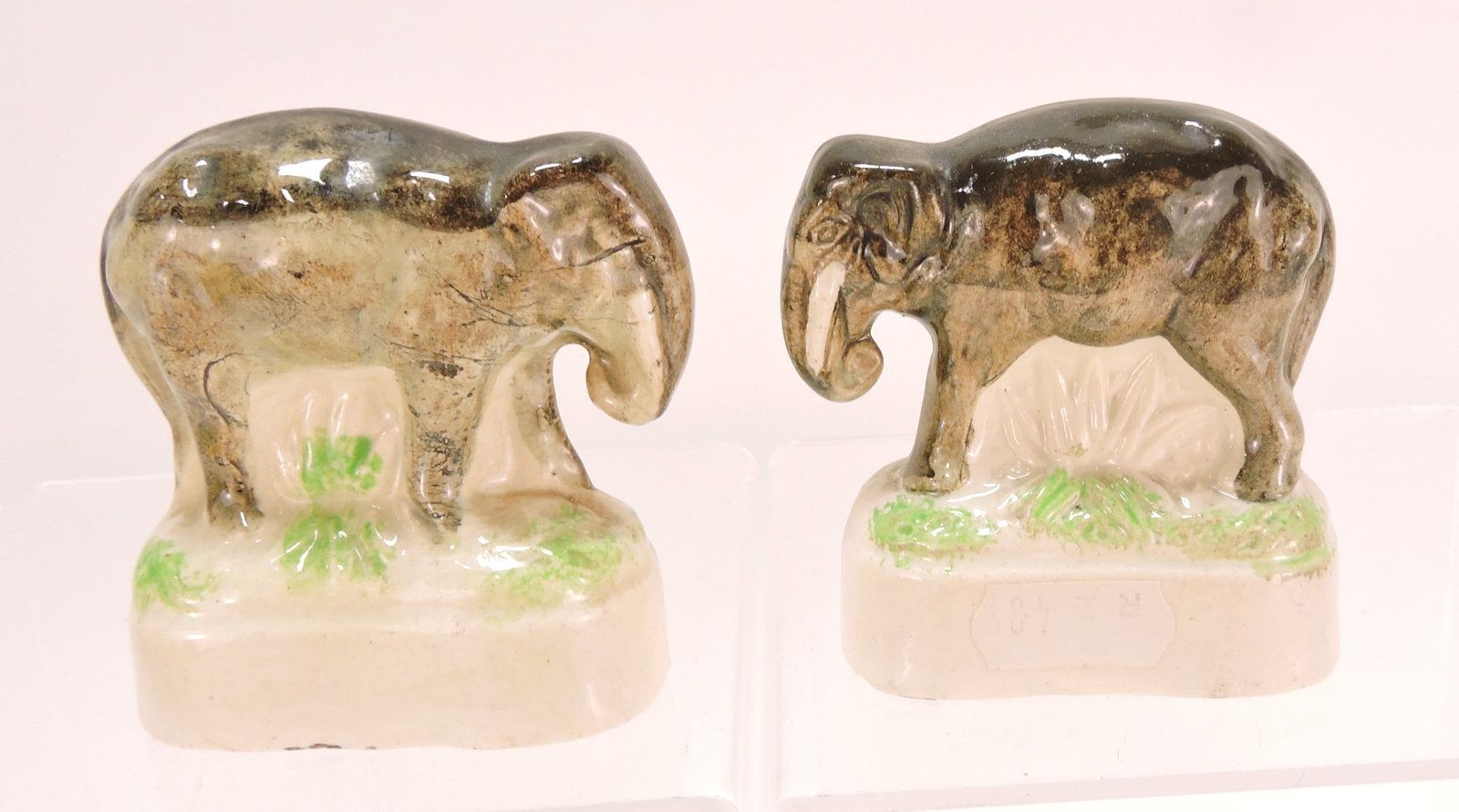 Staffordshire lot of 2 elephant figures,: 3 1/2"