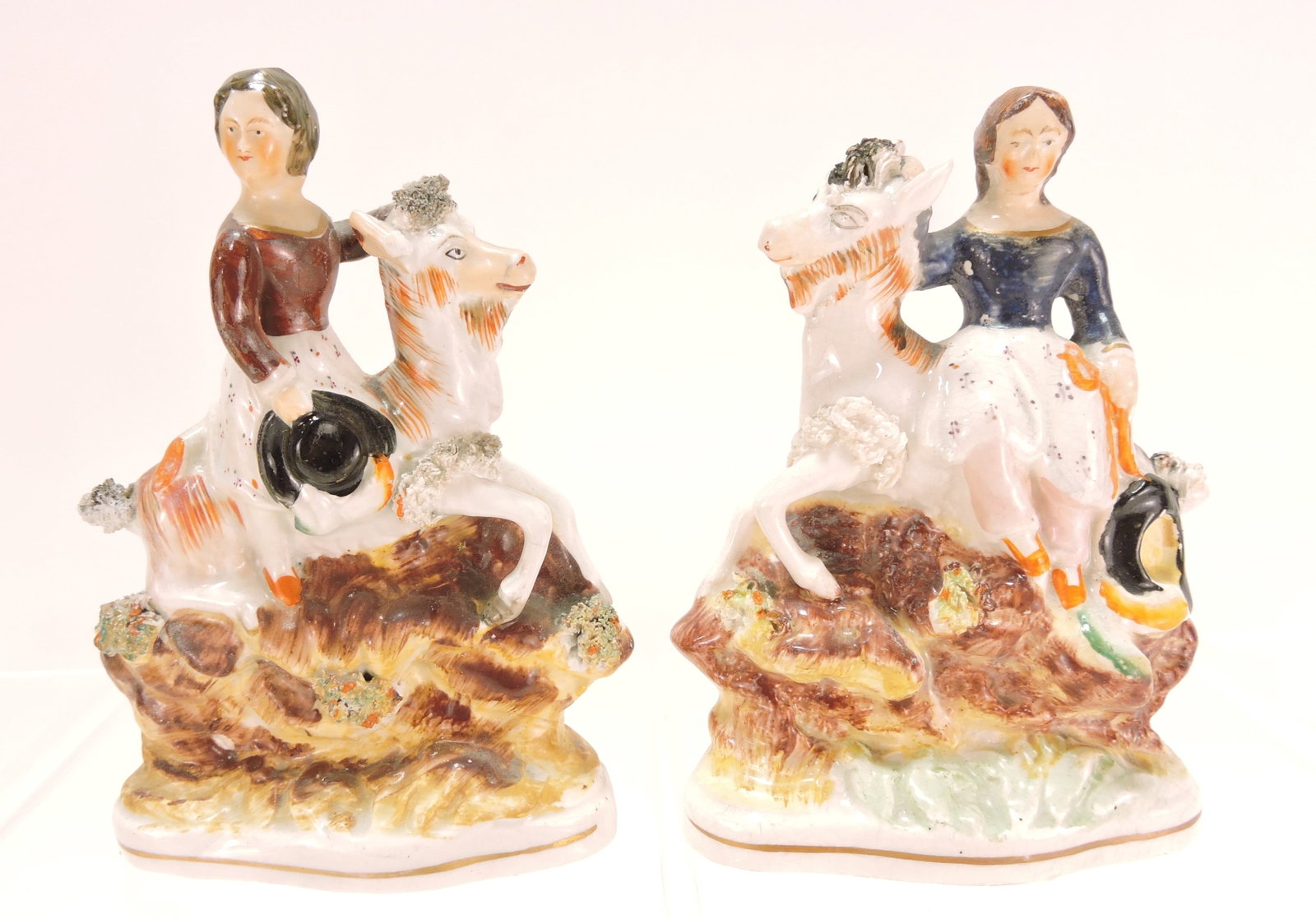 Staffordshire pair of goats with children,: 6"