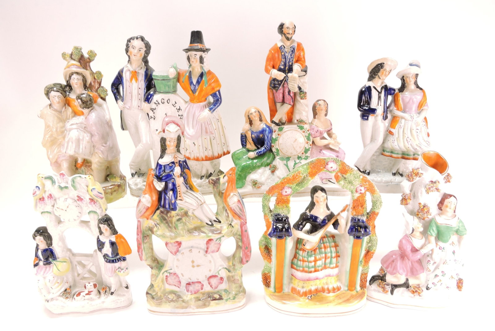 Staffordshire lot of 8 figures,: 9 1/2" to 12"
