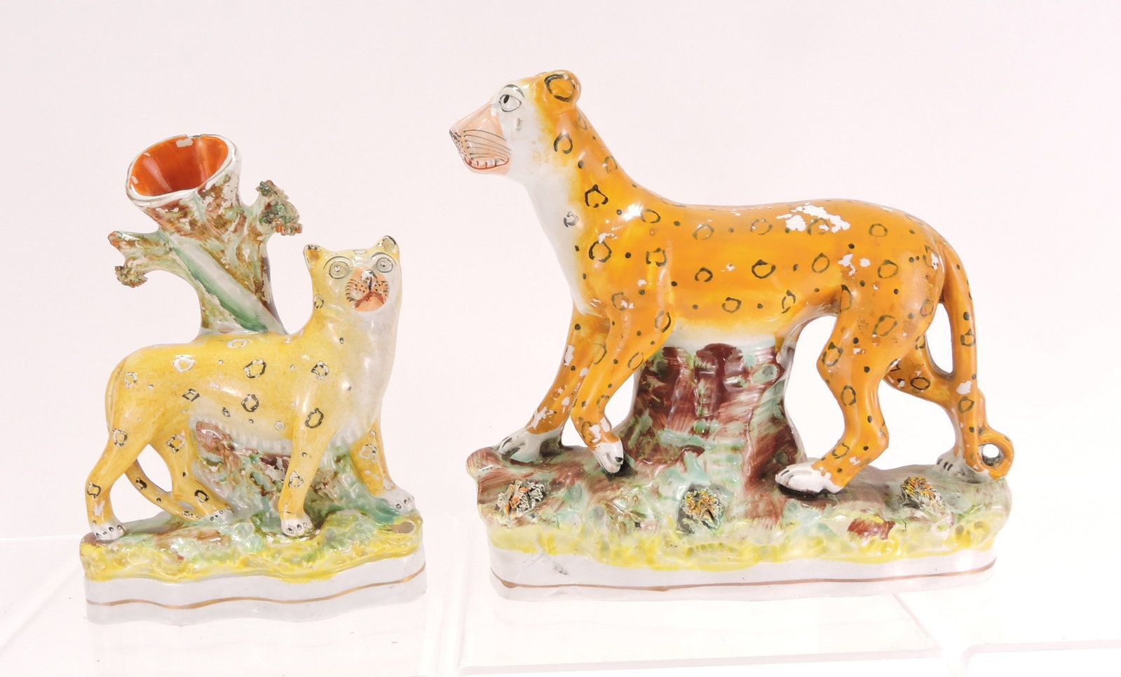 Staffordshire lot of 2 leopard figures,: 6 1/2" to 7"