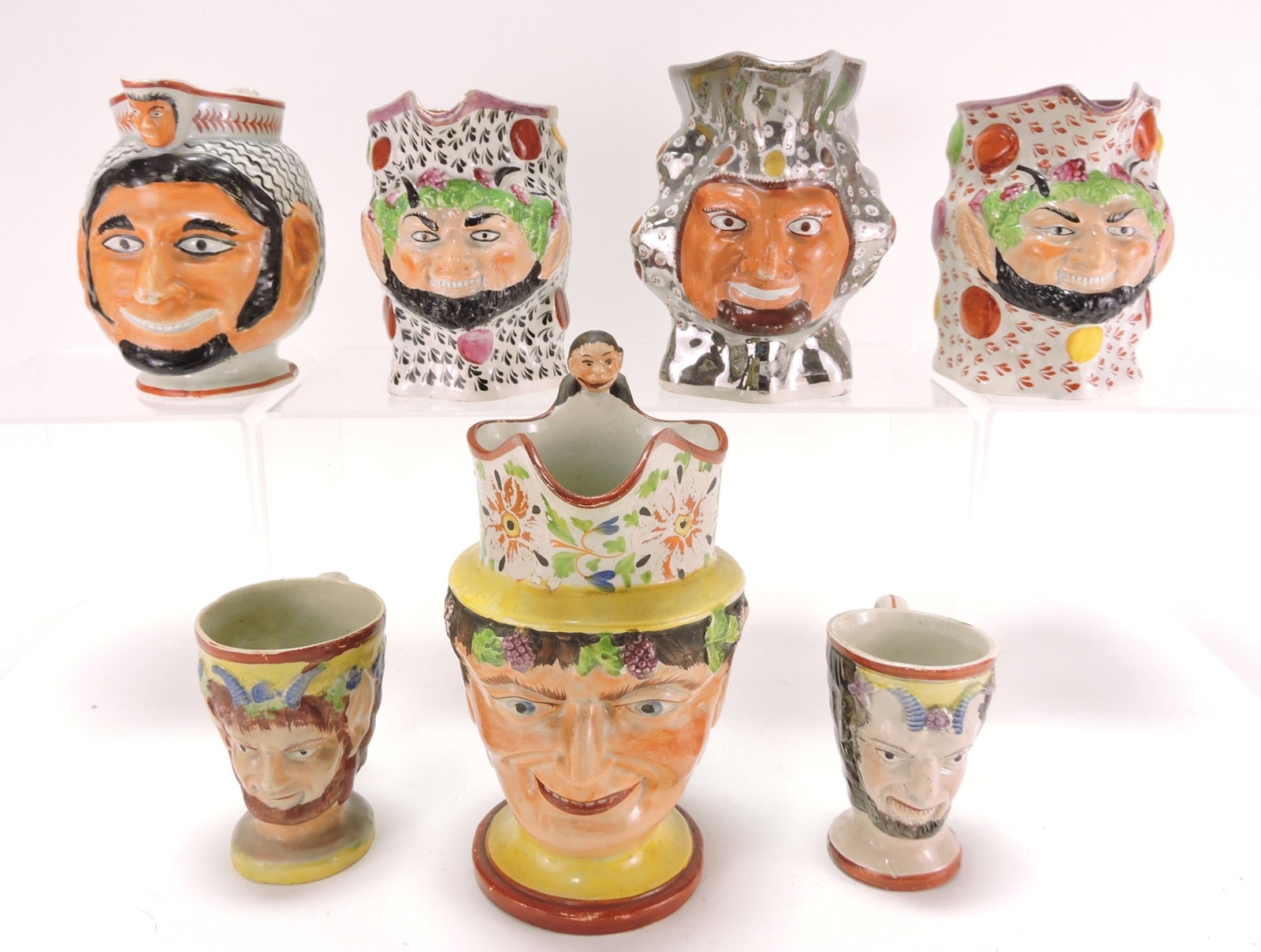 Staffordshire lot of 7 face jugs, (1 of 1)