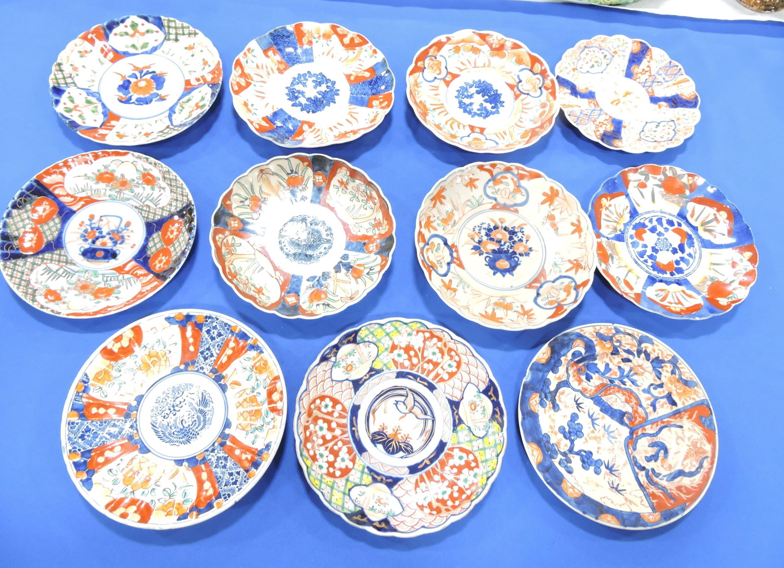 Imari lot of 11 - 8 1/2" plates,: various condition