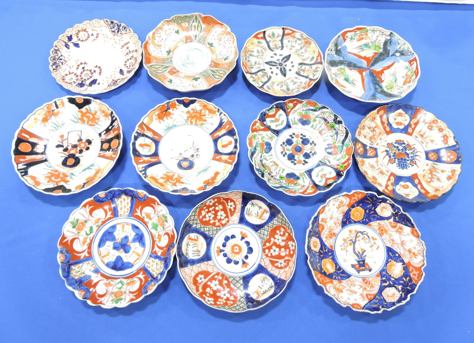 Imari lot of 11 - 8 1/2" plates,: various condition