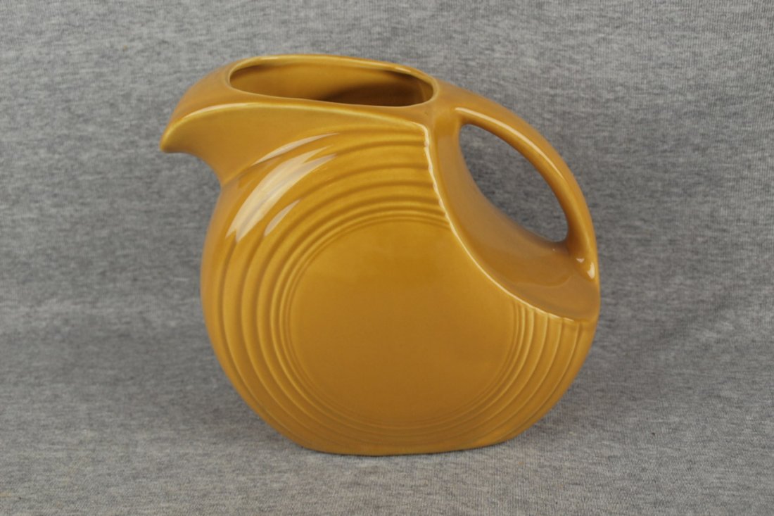 Fiesta Ironstone gold disk water pitcher: Fiesta Ironstone gold disk water pitcher