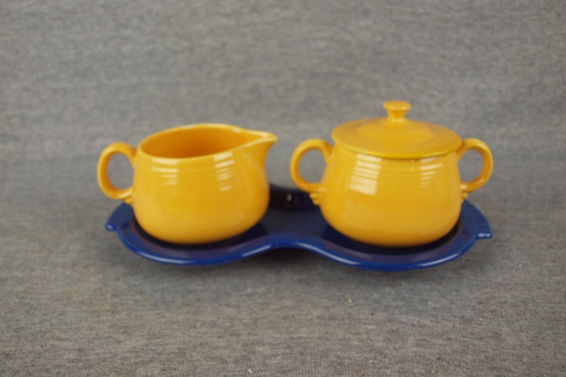 Fiesta individual cream and sugar set with yellow cream: Fiesta individual cream and sugar set with yellow creamer and sugar, cobalt figure 8