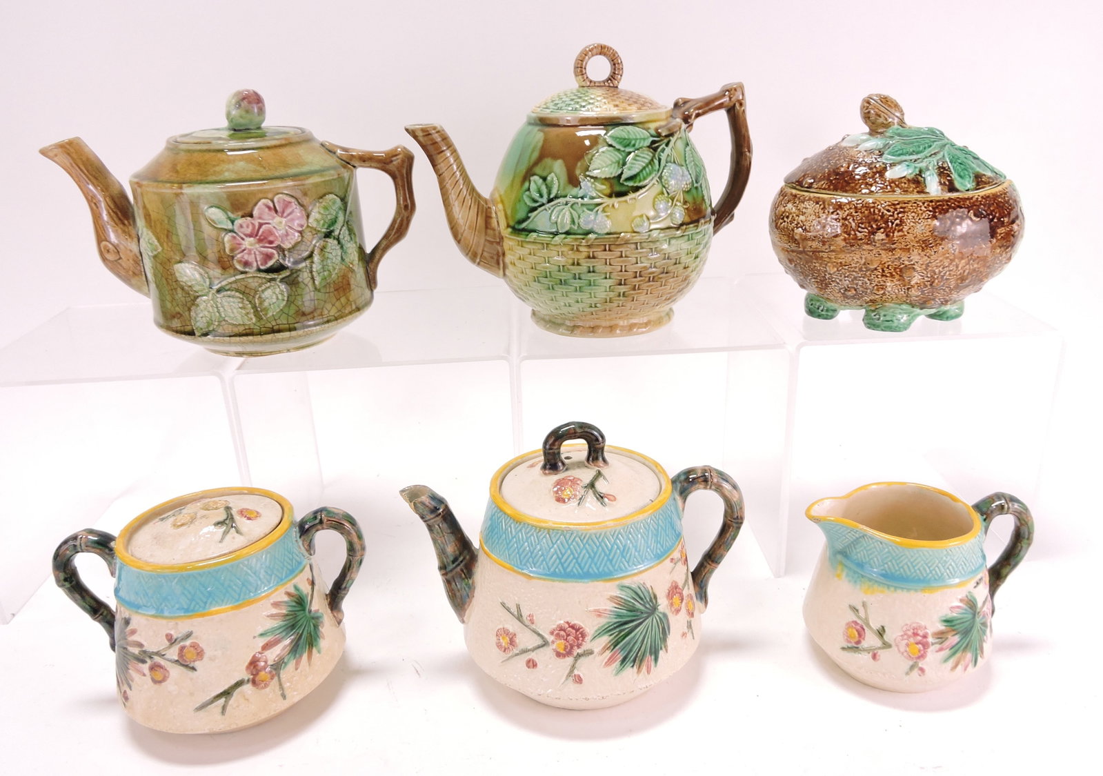 Majolica lot of 3 teapots, 2 sugars and (1 of 1)