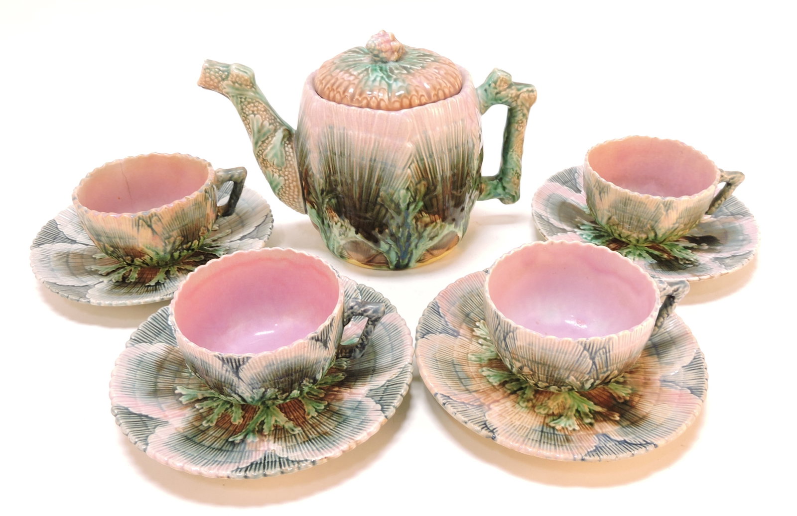 Etruscan majolica tea set with teapot and: 4 cups & saucers, various condition
