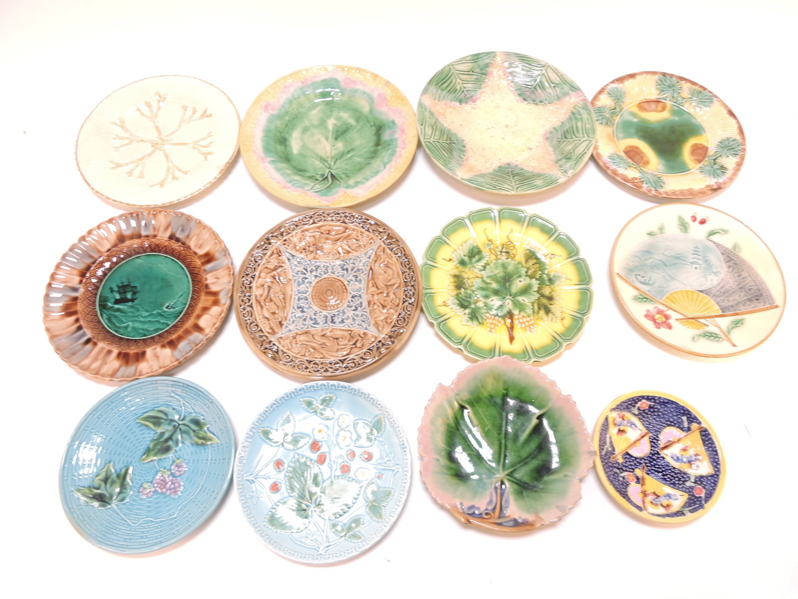 Majolica lot of 12 plates, 5" to 9",: various condition