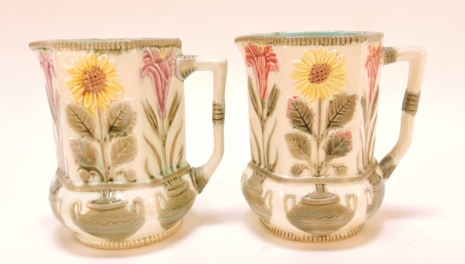 Wedgwood Argenta majolica pair of: sunflower and urn 4 1/4" pitchers