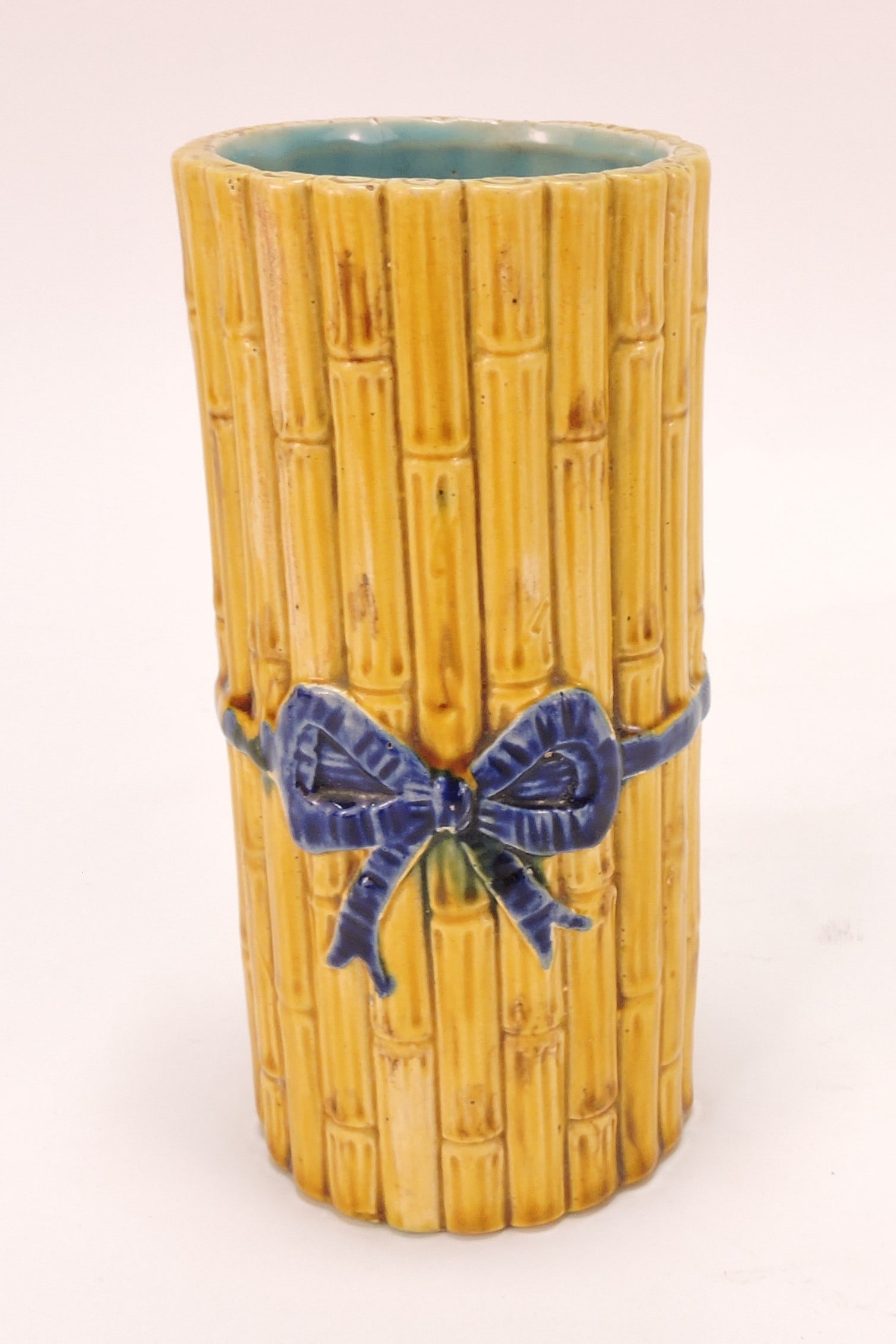 George Jones majolica bamboo, ribbon,: and bow vase, 5 1/2", hairline crack