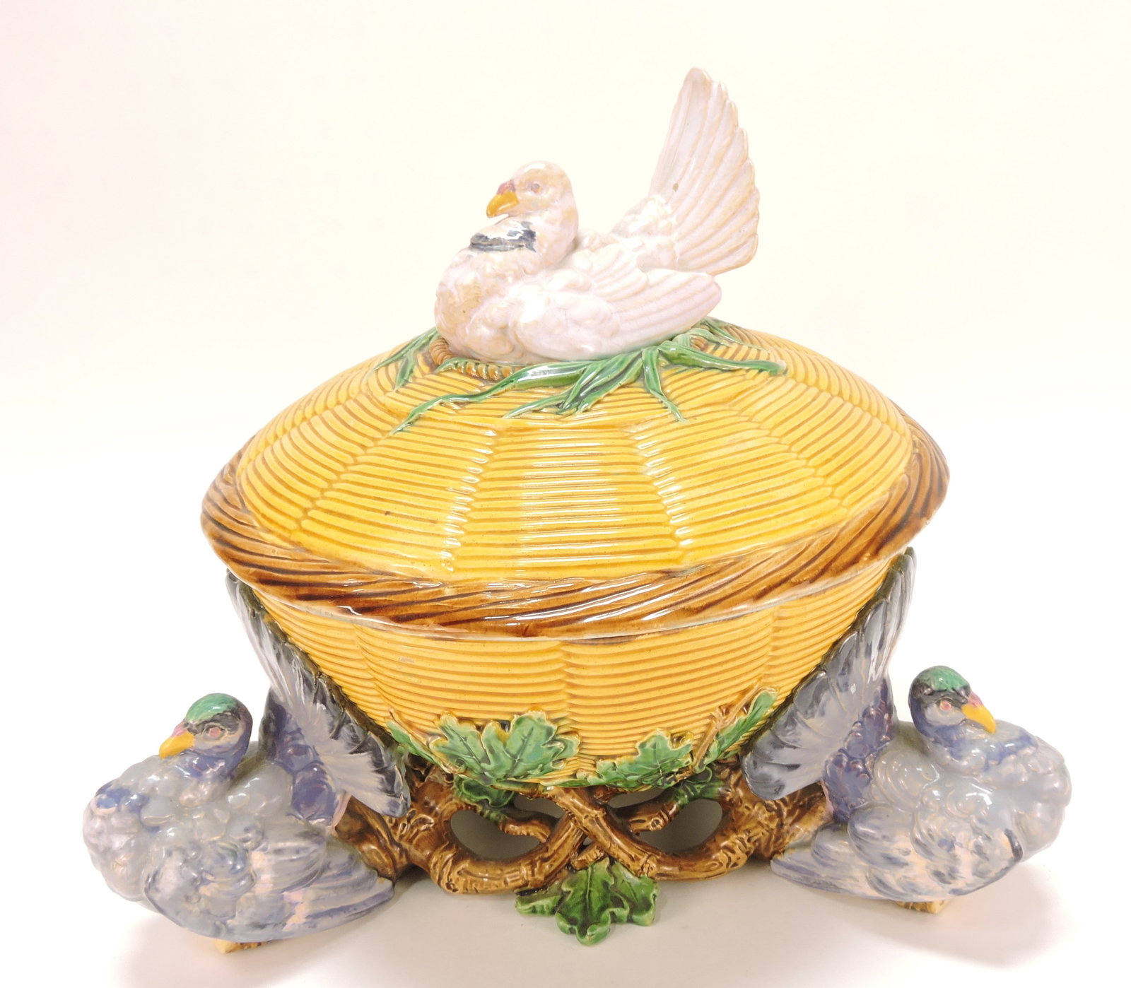 Minton majolica wicker game dish: with pigeon on cover and three pigeons on base, 11"h, 12 1/2"w