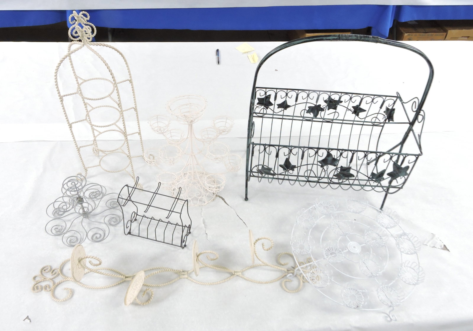 Lot of wire/wrought iron displays: .
