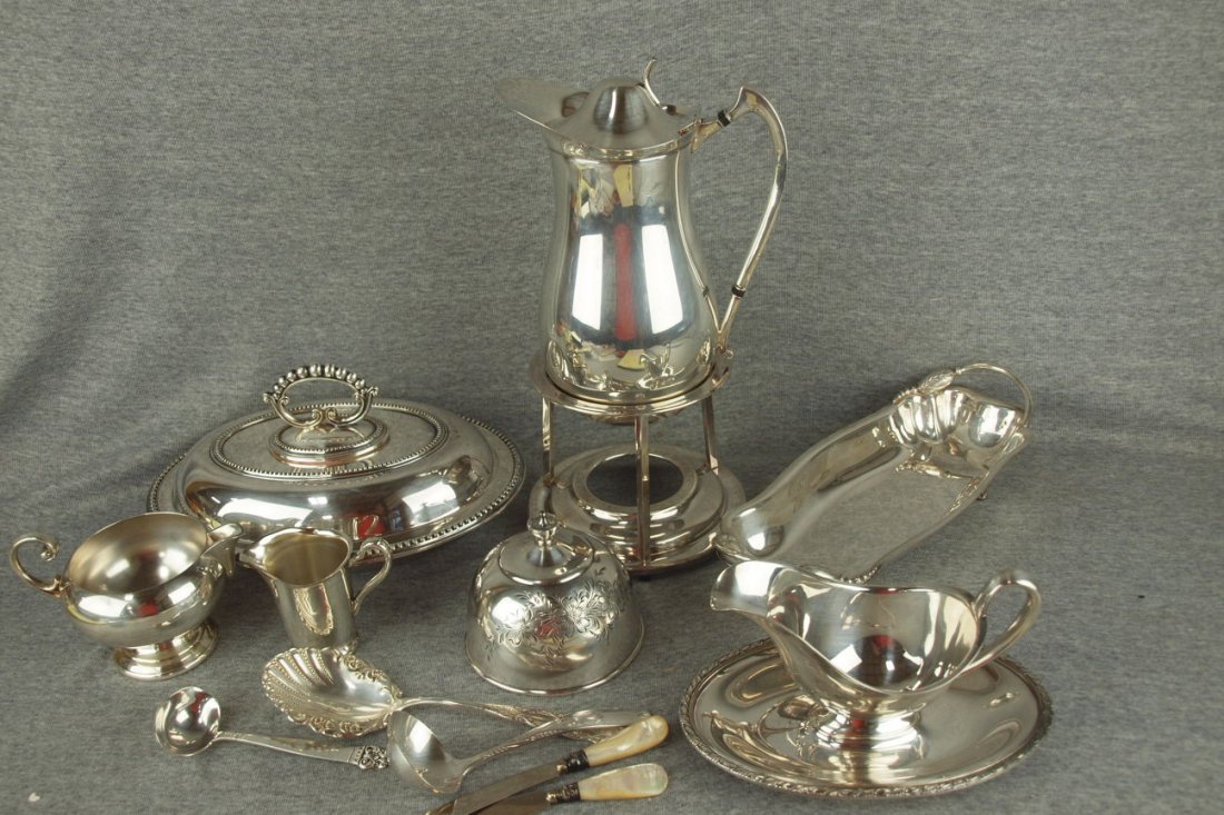 Lot of 7 silver plate serving pieces and 5 pieces of: Lot of 7 silver plate serving pieces and 5 pieces of flatware