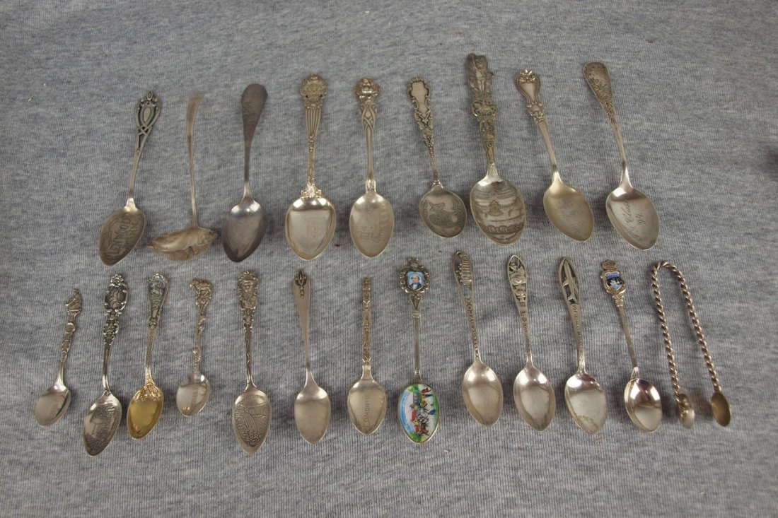 Sterling silver lot of 22 spoons and sugar tongs,: Sterling silver lot of 22 spoons and sugar tongs, mostly souvenir including 1904 Worlds Fair, St. Louis, 9.67 oz
