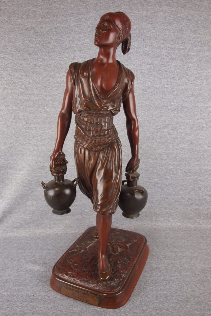 French bronze of a man carrying jugs of wine, "Porteur: French bronze of a man carrying jugs of wine, "Porteur D' E au Tunisien Par Debut,Prix De Rome, 24 1/2", O.C. Bronz Garannnti, AuTitre Foundry seal and original plaque