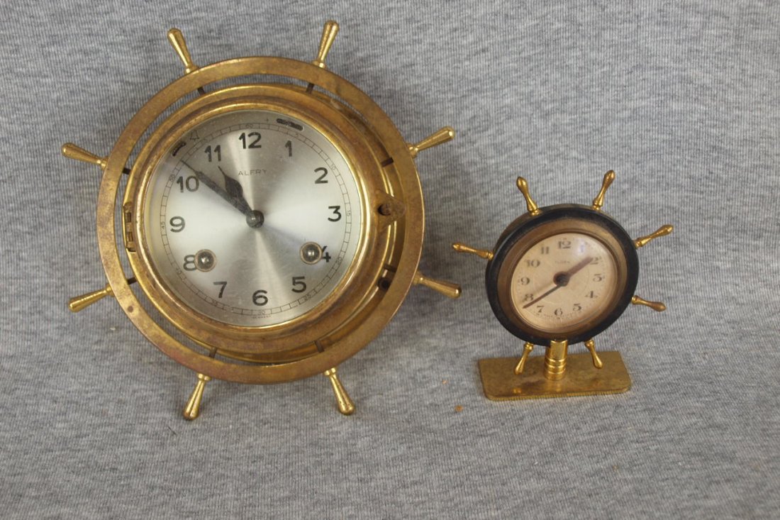 Two brass ship's wheel clocks, 1 Alfrey 8 1/2" and: Two brass ship's wheel clocks, 1 Alfrey 8 1/2" and German 4 1/2"
