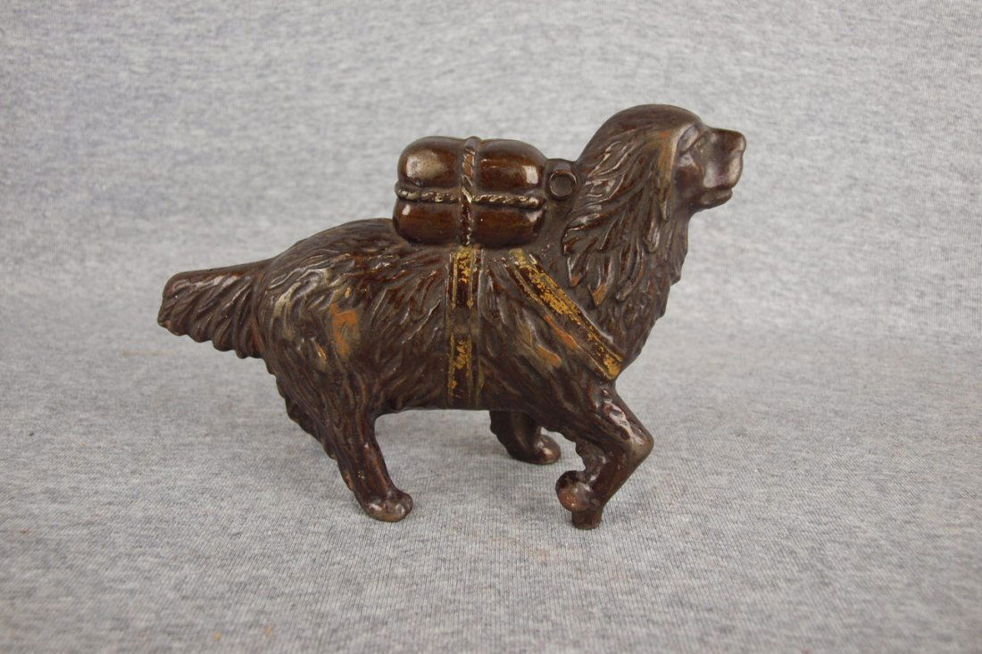 A.C. Williams St. Bernard with back pack cast iron: A.C. Williams St. Bernard with back pack cast iron bank, 8"