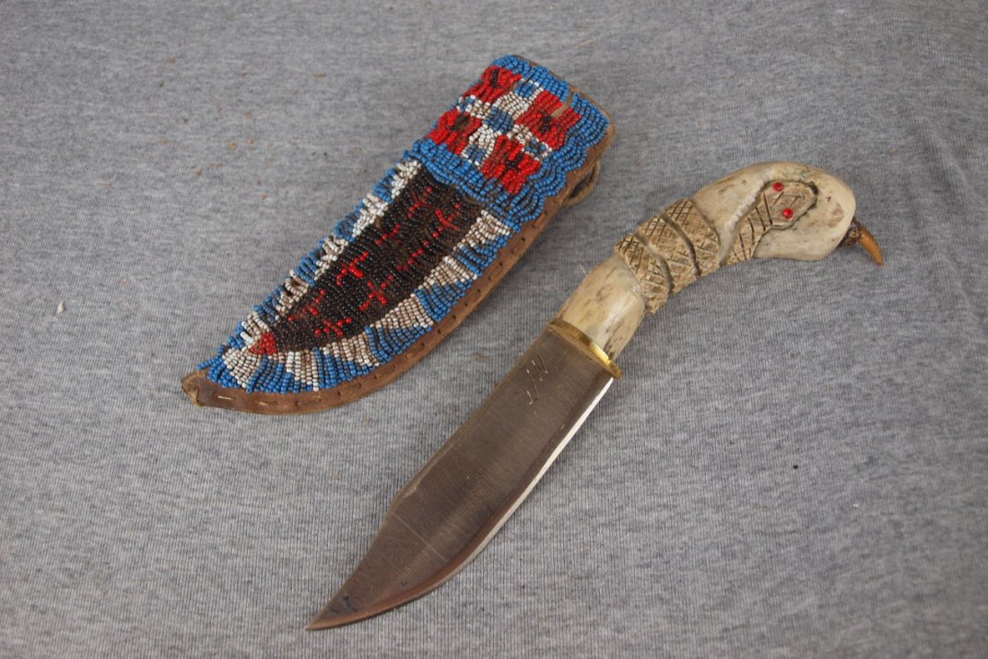 American Indian bone handled knife with leather beaded: American Indian bone handled knife with leather beaded sheath, signed JW