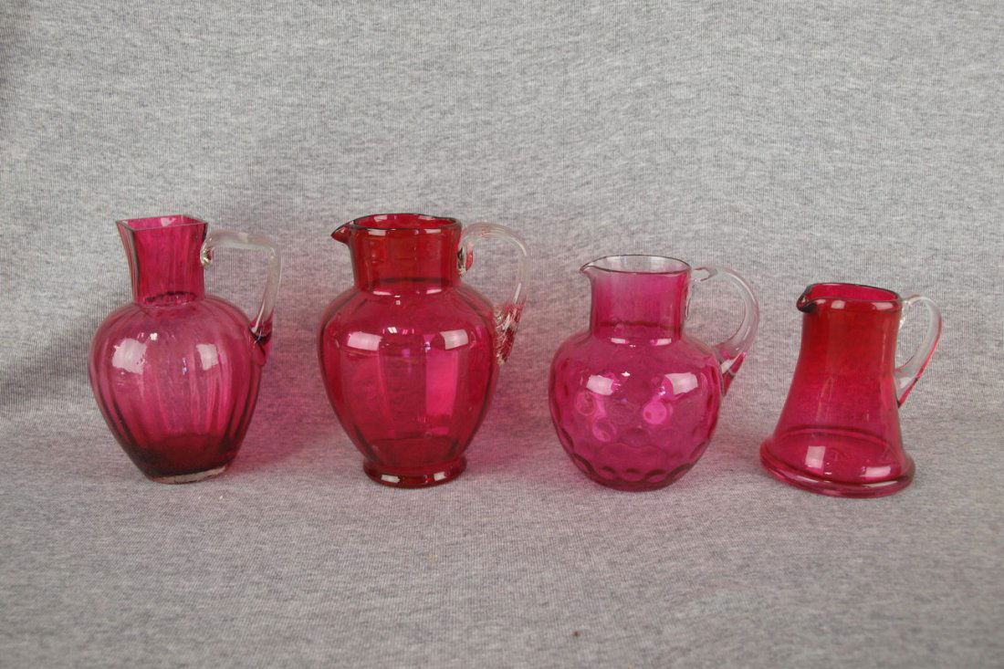 Cranberry glass lot of 4 pitchers, 4 1/2" to 6": Cranberry glass lot of 4 pitchers, 4 1/2" to 6"