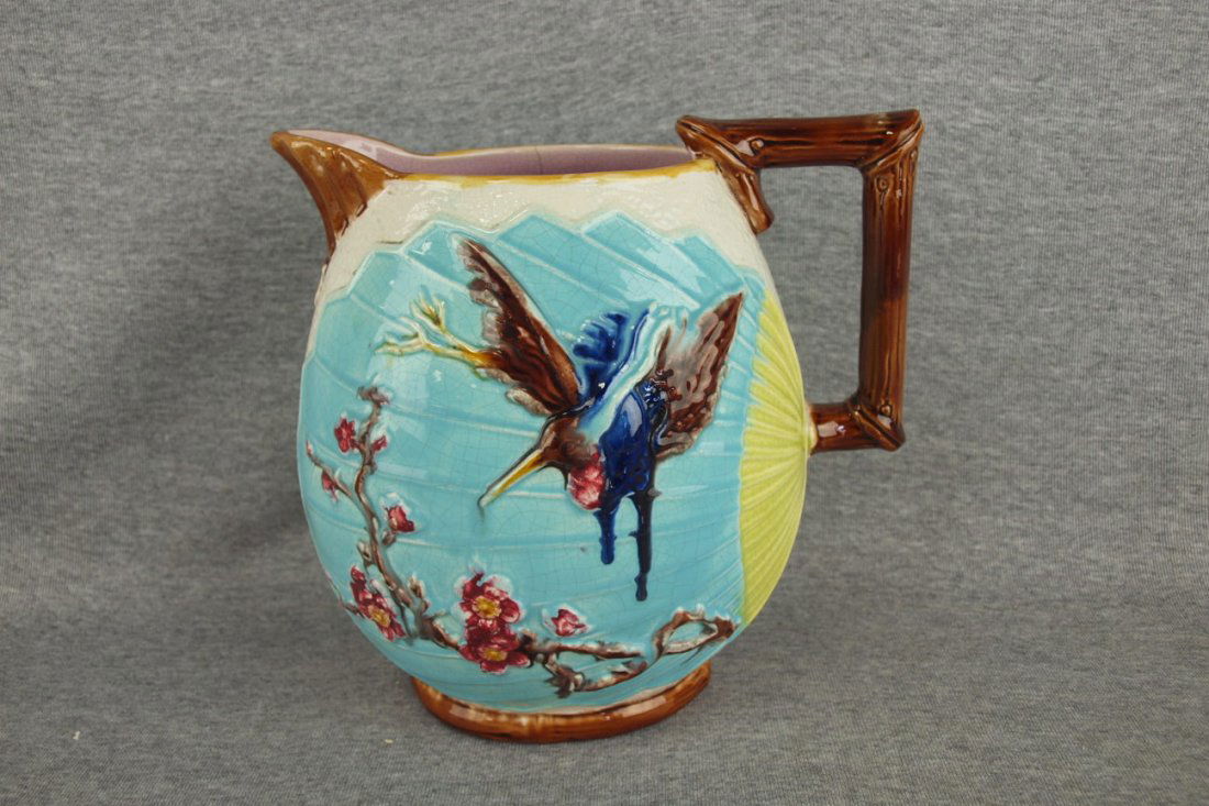 Wardle majolica bird and fan pitcher with bamboo: Wardle majolica bird and fan pitcher with bamboo handle, 9", hairline