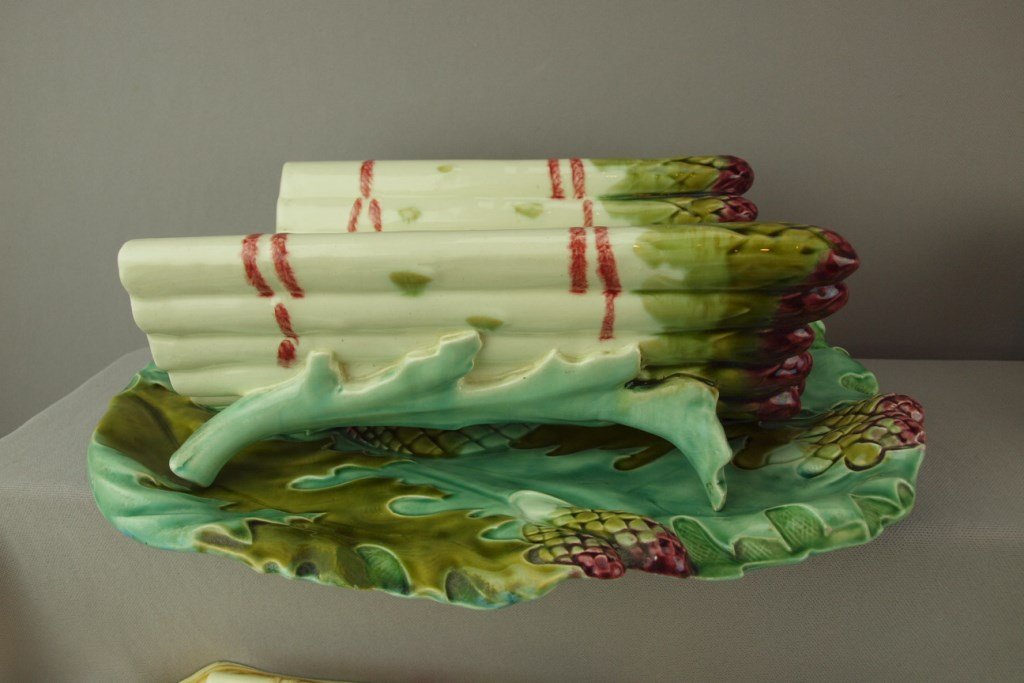 French majolica asparagus platter and matching cradle,: French majolica asparagus platter and matching cradle, hairline to cradle, 14"l