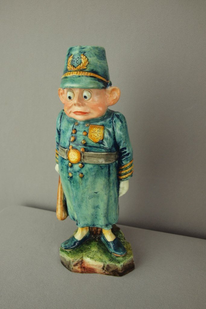 Continental Palmer Cox Brownie policeman figural candle: Continental Palmer Cox Brownie policeman figural candle holder, 9 1/4"