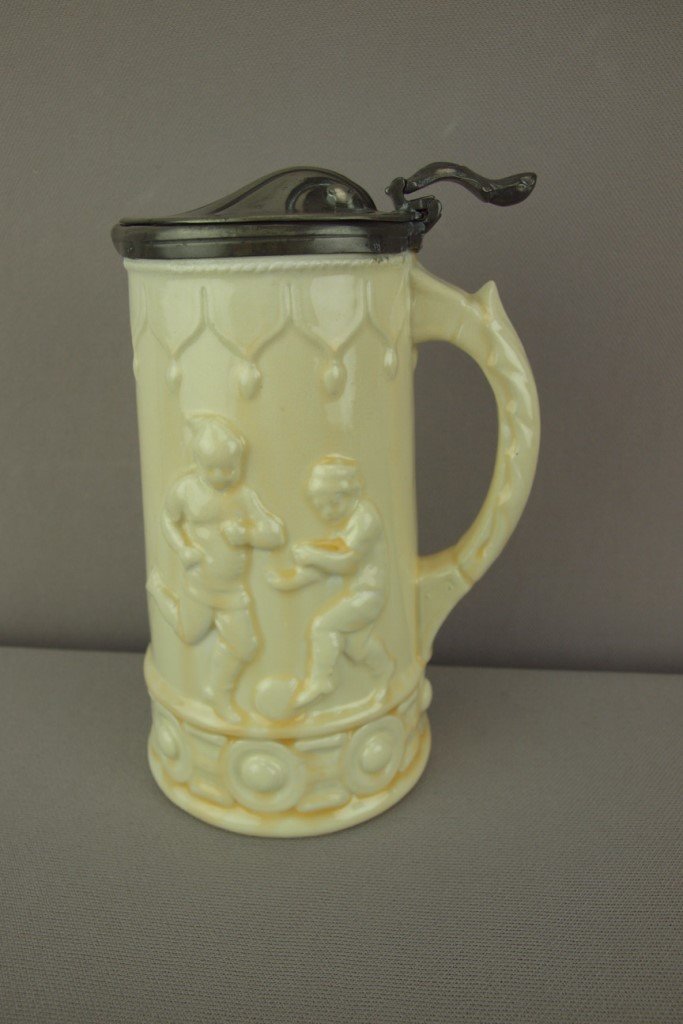 WEDGWOOD rare white majolica soccer and cricket jug: WEDGWOOD rare white majolica soccer and cricket jug with pewter top, 6 1/4", pewter lid made by James Dixon & Sons Sheffield, England