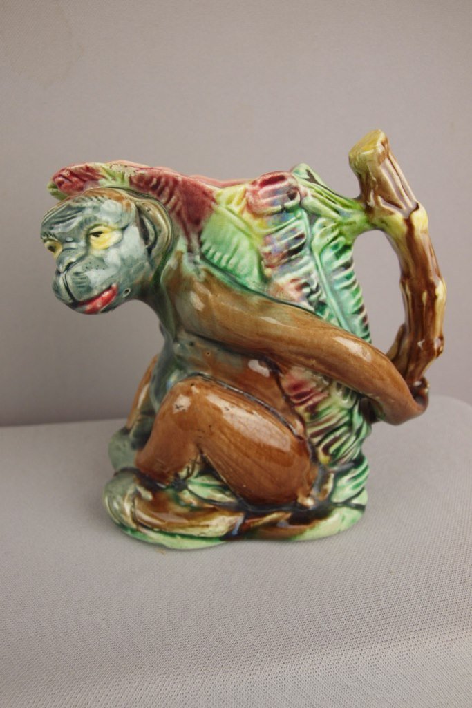 Majolica figural monkey and bamboo pitcher, 5 1/2",: Majolica figural monkey and bamboo pitcher, 5 1/2", rare size, ref: Cunningham p. 134, nick to rim, former Stern Collection