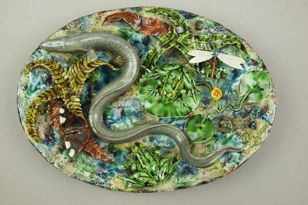 Geoffrey Luff Palissy majolica oval plaque with eel,: Geoffrey Luff Palissy majolica oval plaque with eel, two frogs, dragonfly, butterfly and other fern and sealife, 12"