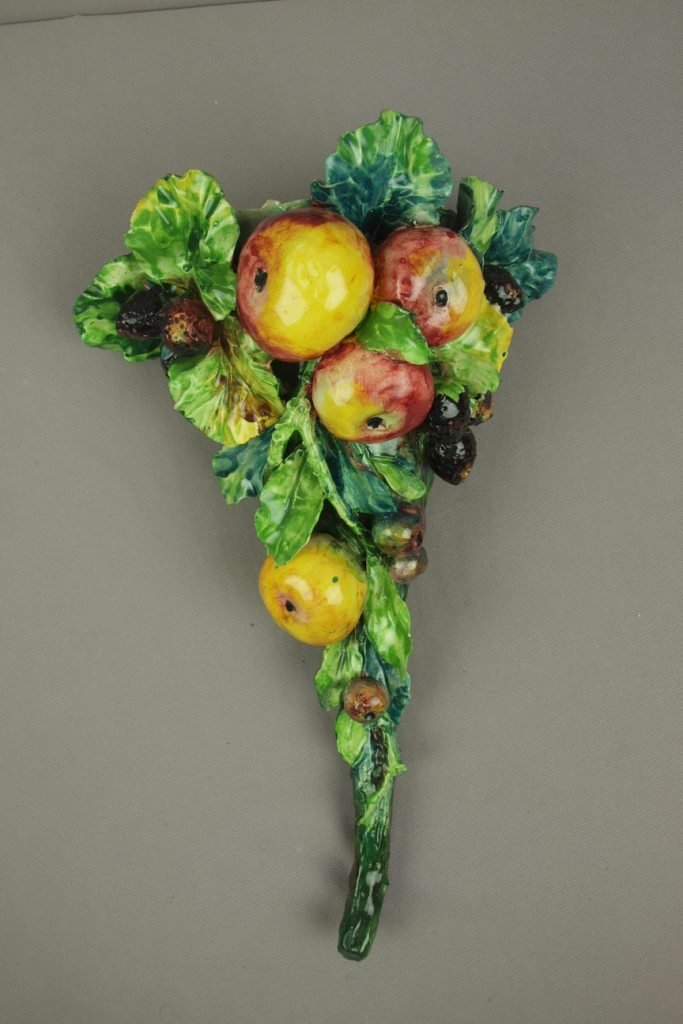 French majolica wall pocket with assortment of applied: French majolica wall pocket with assortment of applied fruit and leaves, 15"