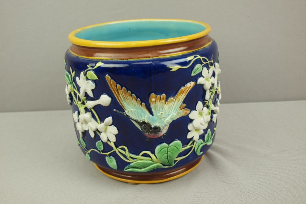 GEORGE JONES cobalt majolica cachepot with hummingbird: GEORGE JONES cobalt majolica cachepot with hummingbird and honeysuckle floral decor, 7"h