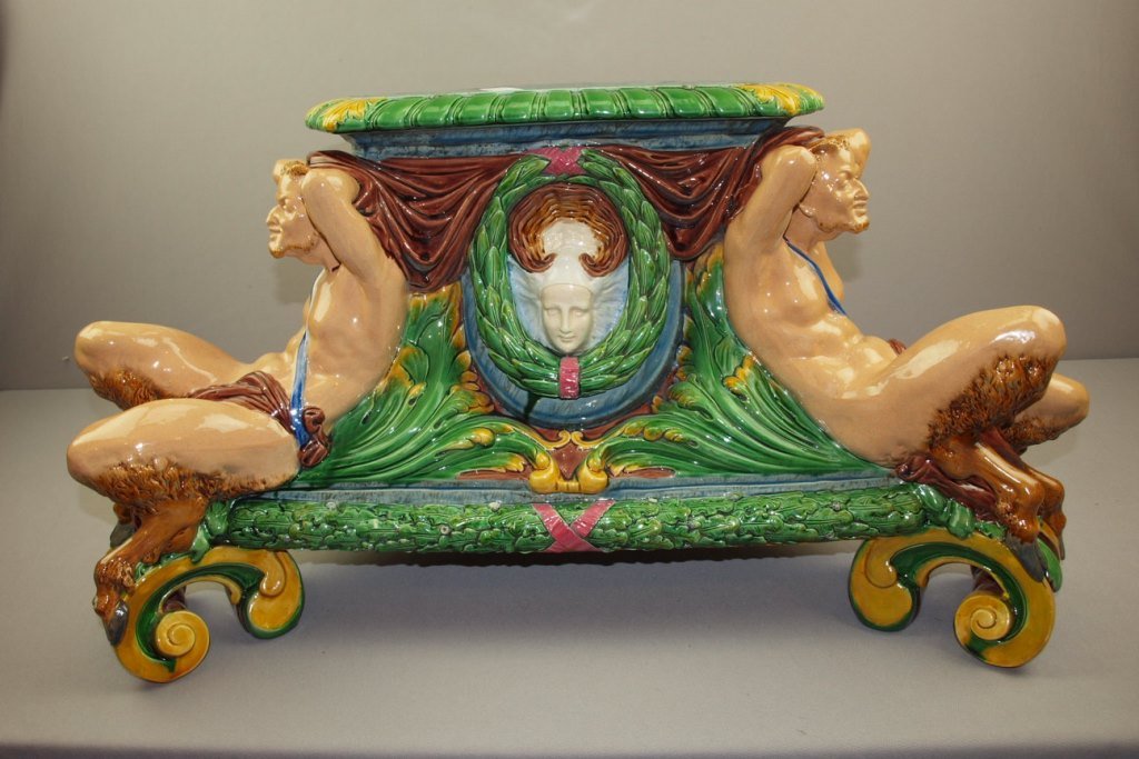 MINTON majolica rare base to Blackamoor figure, shape: MINTON majolica rare base to Blackamoor figure, shape no. 1157, professional repair to high points, 29"w, 16"h, this would make a great coffee table, top has original hole for mounting blackamoor whic