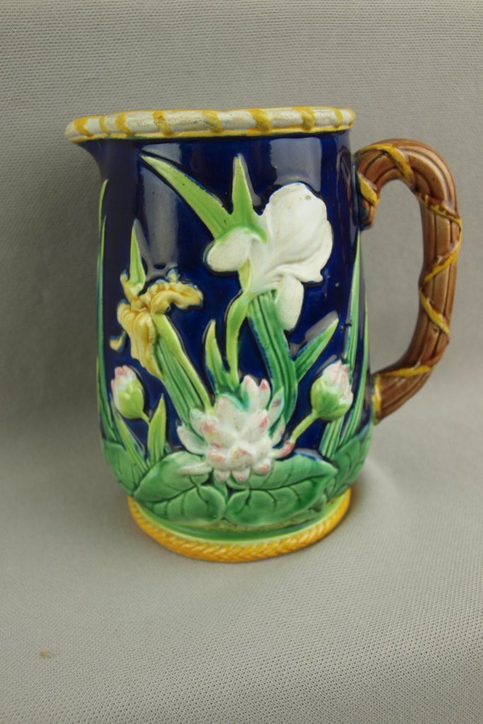 GEORGE JONES majolica cobalt iris and water lily: GEORGE JONES majolica cobalt iris and water lily pitcher, 5 1/2"