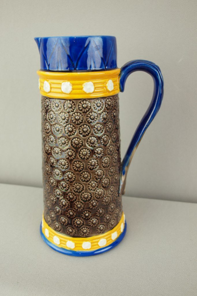 WEDGWOOD majolica pitcher with embossed daisies, 8: WEDGWOOD majolica pitcher with embossed daisies, 8 1/4", professional spout repair