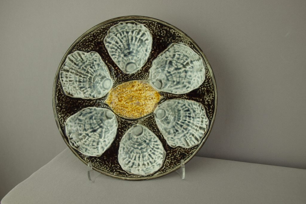 French majolica oyster plate with lemon in center, 8: French majolica oyster plate with lemon in center, 8 3/4"
