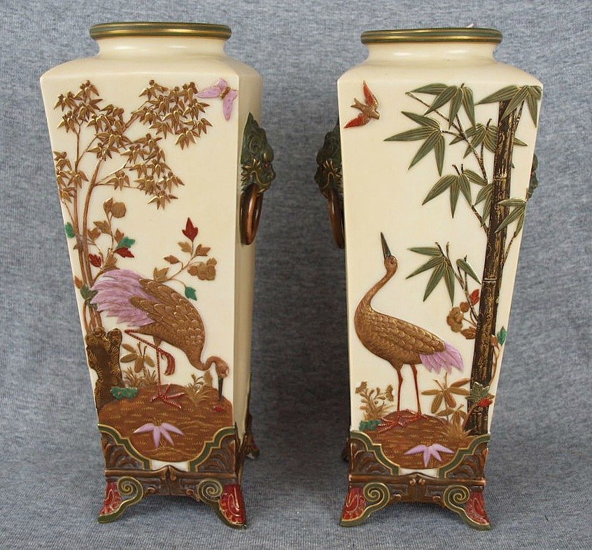 Excellent quality pair of Royal Worcester aesthetic: Excellent quality pair of Royal Worcester aesthetic movement bone china square section ivory ground vases with Japanese style faux bronze storks, bamboo & blossoms c1875, chips to feet restored, 'simi