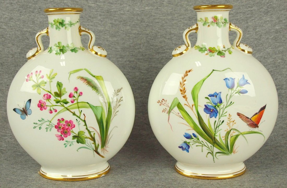 Excellent quality pair of Minton bone china aesthetic: Excellent quality pair of Minton bone china aesthetic movement moon flasks with sprays of hand painted flowers to front and back, c1875, 8"
