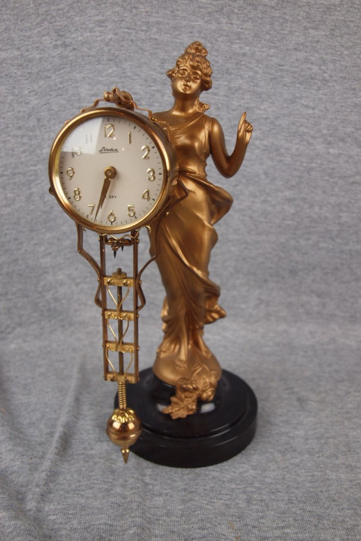 Linden 8 day Art Nouveau lady swing clock 11 1/2": Linden 8 day Art Nouveau lady swing clock 11 1/2"