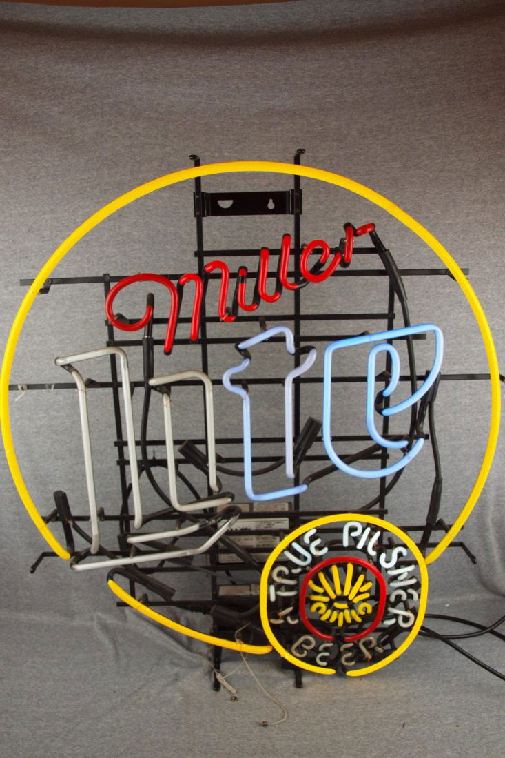 Miller Lite lighted neon sign 33"w: Miller Lite lighted neon sign 33"w